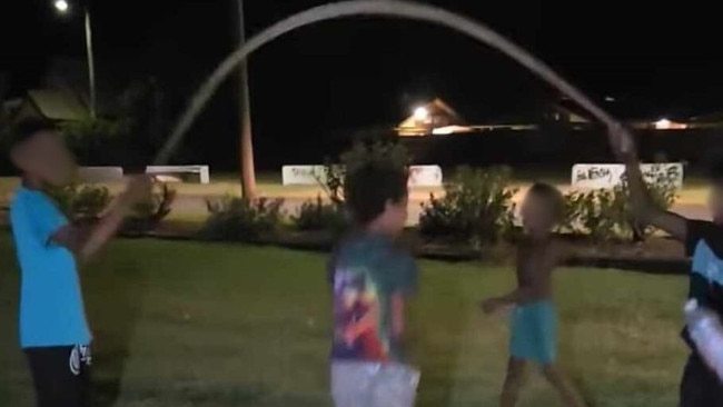 Queensland's environmental department are investigating a video showing several children in Woorabinda using a snake as a skipping rope.