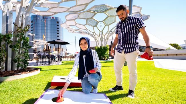 Sakina and Murtaza Hussaini from Ingle Farm playing at Festival Plaza. Picture: Morgan Sette