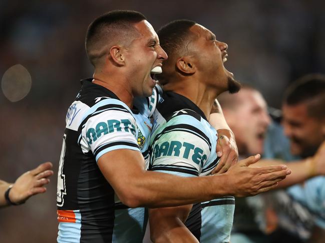 SYDNEY, AUSTRALIA - OCTOBER 02: Sharks players celebrate winning the 2016 NRL Grand Final match between the Cronulla Sharks and the Melbourne Storm at ANZ Stadium on October 2, 2016 in Sydney, Australia. (Photo by Cameron Spencer/Getty Images)