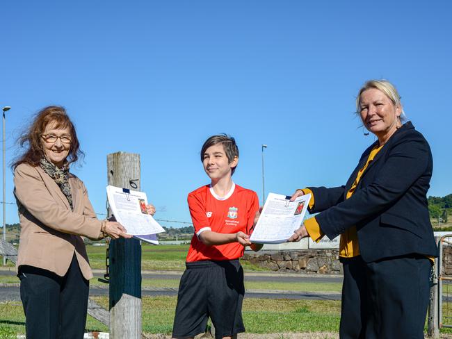 GAME ON: L-R Member for Lismore, Janelle Saffin with 11 yo football player Oliva Bastion and MP for Sport and Recreation Lynda Voltz.