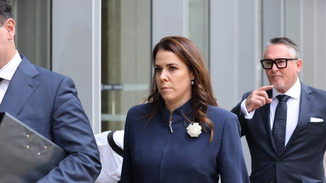 Ms Roberts arrives at the Federal Court in Sydney on Tuesday to testify where she was grilled on brutal texts she sent about her husband during their divorce. Picture: NCA NewsWire / David Swift