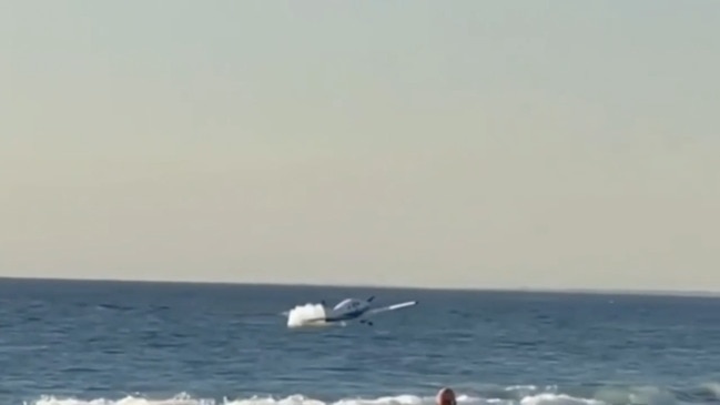 Moment mother crash lands plane at WA beach (Nine)