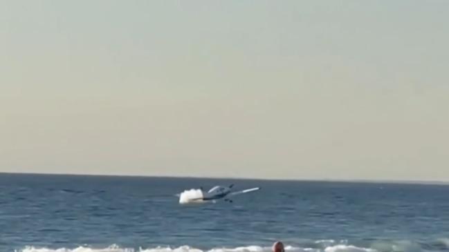 Moment mother crash lands plane at WA beach (Nine) 