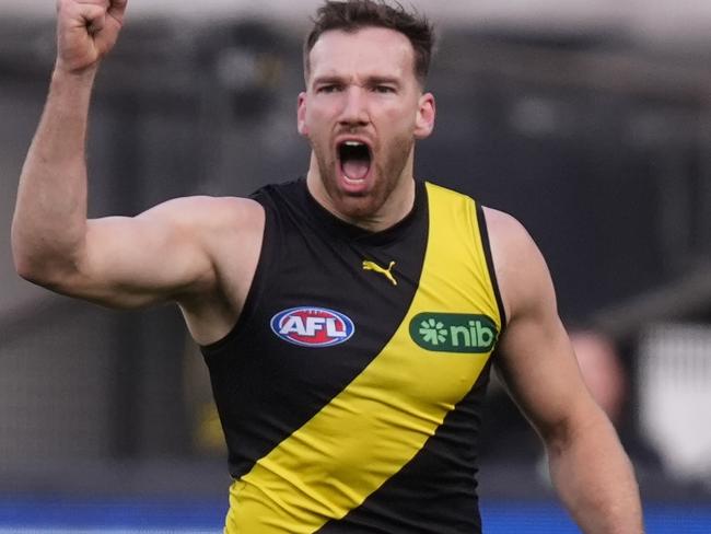 MELBOURNE, AUSTRALIA - JUNE 30: Noah Balta of the Tigers celebrates kicking a goal during the round 16 AFL match between Richmond Tigers and Carlton Blues at Melbourne Cricket Ground, on June 30, 2024, in Melbourne, Australia. (Photo by Daniel Pockett/Getty Images)