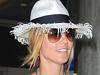 Heidi Klum has a colorful arrival at LAX Airport