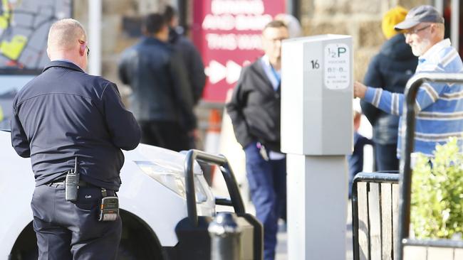 Hobart’s controversial new parking meters keep charging after the city’s inspectors are done for the day. Picture: MATT THOMPSON