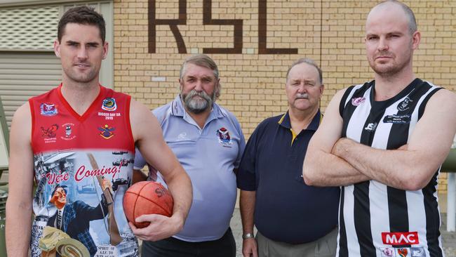 Flagstaff Hill captain David Kearsley, Southern Football League president Craig Warman, Morphett Vale RSL president Ron Payne and Reynella captain Ben Lockett. Picture: AAP Image/Brenton Edwards.