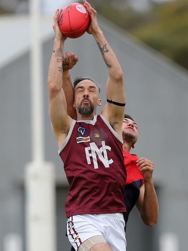 Nullawil’s Andrew Oberdorfer marks in front of Wycheproof-Narraport’s Josh Walsh.