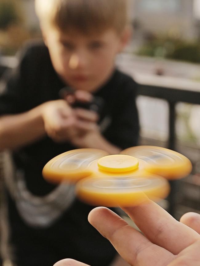 Fidget Spinners are the latest craze to hit the playground. Picture: Matthew Farrel