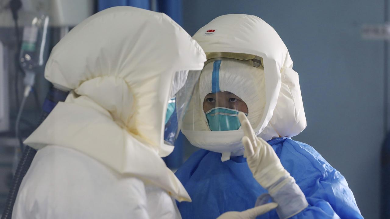 Medical staff work in an isolation ward in Jinyintan Hospital, designated for critical COVID-19 patients, in Wuhan in central China's Hubei province. Picture: Chinatopix via AP