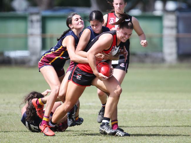 Saints' Poppy Boltz proved too strong for the Lions in the Cairns Women's match between the Cairns Saints and the Cairns City Lions, held at Griffiths Park, Manunda. Picture: Brendan Radke