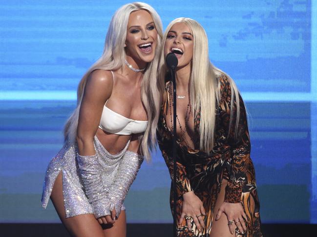 Gigi Gorgeous and Bebe Rexha introduce a performance by Shawn Mendes at the 2016 American Music Awards. Picture: AP