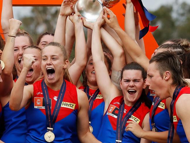 IPSWICH, AUSTRALIA - NOVEMBER 27: The Demons celebrate with the premiership cup during the 2022 AFLW Season 7 Grand Final match between the Brisbane Lions and the Melbourne Demons at Brighton Homes Arena, Springfield, Ipswich on November 27, 2022 in Ipswich, Australia. (Photo by Dylan Burns/AFL Photos via Getty Images)