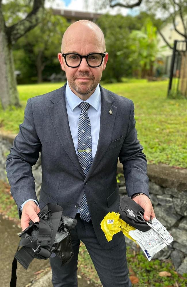 Queensland Police Union president Shane Prior with a medical tourniquet.