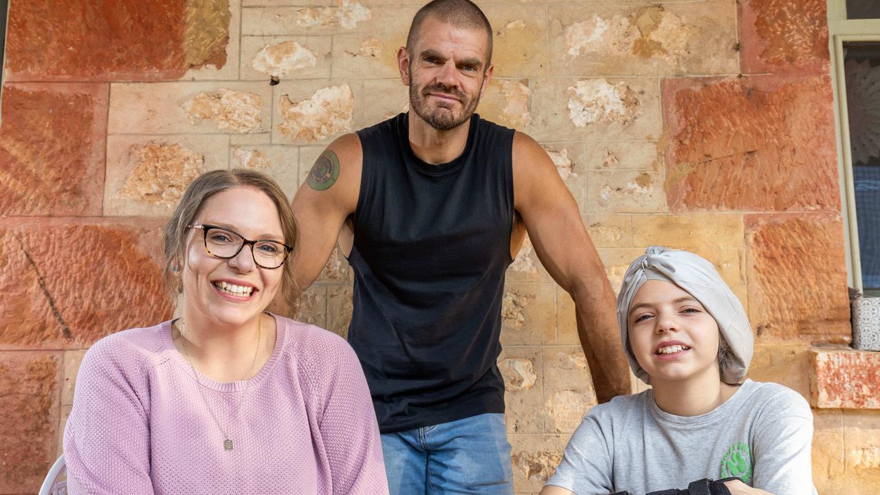 Harmony Jones with her parents Corey and Bianca, at their home in Gawler River, SA. Pictured on May 10th 2025. Picture: Ben Clark