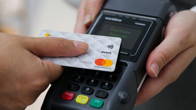 Legislation to change how surcharges are applied to debit cards by customers has been held up. Picture: NewsWire / Gaye Gerard