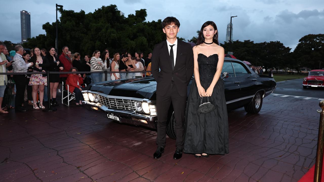 Students arrive for Robina State High formal at HOTA. Kaia McManus and Jack Huawai. Picture: Glenn Hampson.