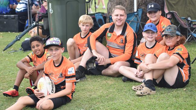 Magpies under-12 players with coach Lewis Della-Bosca at the Red Rooster Junior Touch Carnival at Cyril Connell Fields, Rockhampton, on November 5, 2022.