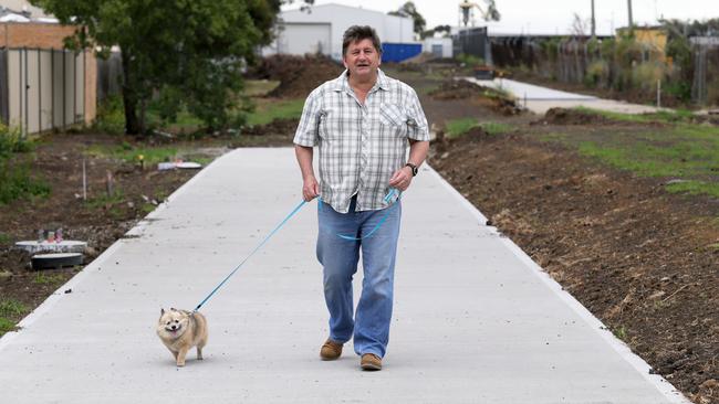 Mayor Geoff Porter and his dog Peppa are looking forward to the completion of Meadowlink. Picture: George Salpigtidis