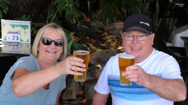 Ray and Dianne Cook enjoy their first drink as Darwin's 72 hour lock down ended on Thursday. Picture: Glenn Campbell