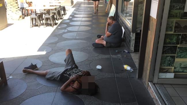 A man passed out on at St Kilda footpath. Picture: Supplied