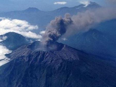 Instagram photo of the smoke and ash from Indonesian volcano Mount Raung which began errupting last week causing chaos and cancellation of flights to and from Bali due the danger to planes from the ash cloud. Instagram photo by @trianasaputri (triana)