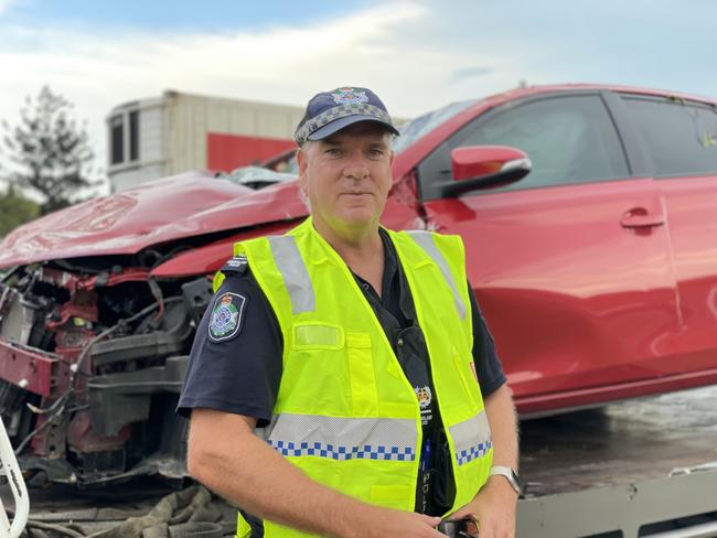 District Duty Officer Senior Sergeant Kyle Gould speaking from the scene of the crash. Picture: Fergus Gregg