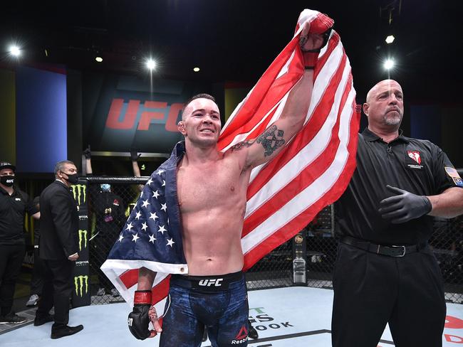 LAS VEGAS, NEVADA - SEPTEMBER 19: In this handout image provided by UFC, Colby Covington reacts after his TKO victory over Tyron Woodley in their welterweight bout during the UFC Fight Night event at UFC APEX on September 19, 2020 in Las Vegas, Nevada. (Photo by Chris Unger/Zuffa LLC via Getty Images)