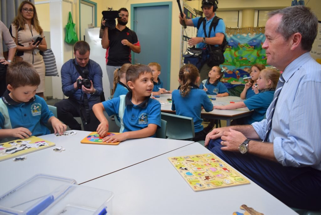 Seth Armstrong and Punaika Taitau talk to Bill Shorten. Photo: Emily Smith