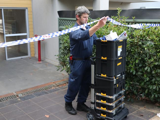 Police removed items from the apartment today. Picture John Grainger