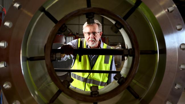 ADELAIDE, AUSTRALIA - NewsWire Photos February 13, 2023:  Wellsun Engineering Managing Director Shaun Hall at his Lonsdale workshop with some of the equipment and materials they're providing for the Santos' carbon capture and storage project at Moomba.Picture: NCA NewsWire / Kelly Barnes