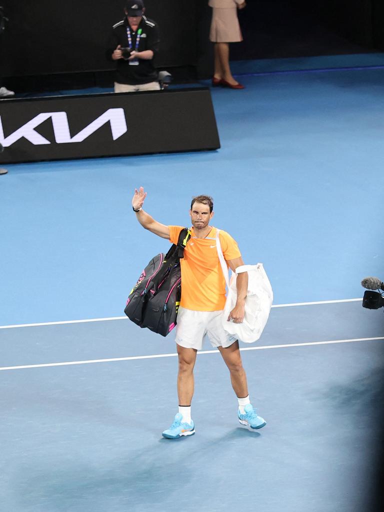 Nadal waves goodbye. (Photo by Martin KEEP / AFP)