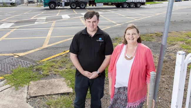 Lytton workers Chris Chandler and Bronwyn Brown have campaigned for a fix for the dangerous Lindum crossing for years. Picture: AAP Image/Richard Walker