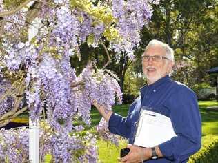 Carnival of Flowers 2013. Judge for the City section of the Chronicle Garden Competition, Lawrie Smith in the garden of Kevin and Dianna Drew, Ward Street, Highfields Photo: Bev Lacey / The Chronicle. Picture: Bev Lacey