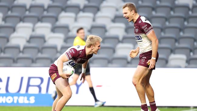 SYDNEY, AUSTRALIA - JULY 03: Ben Trbojevic of the Sea Eagles celebrates with his team mate Tom Trbojevic after scoring a try only to have it disallowed during the round 16 NRL match between the Canterbury Bulldogs and the Manly Sea Eagles at Stadium Australia, on July 03, 2021, in Sydney, Australia. (Photo by Mark Kolbe/Getty Images)