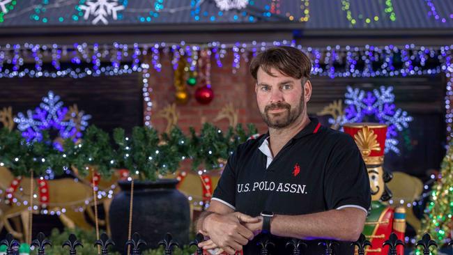 Burton florist Rohan McQueen is spreading Christmas joy with his festive light display. Picture: Ben Clark