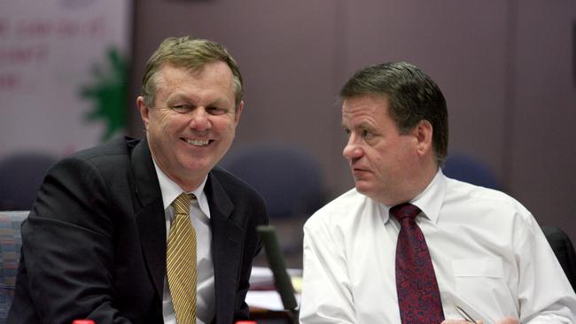 There was an attempt to remove Former South Australian Premier Mike Rann (left) from the Spacetalk board last year. Pictured with Treasurer Kevin Foley.