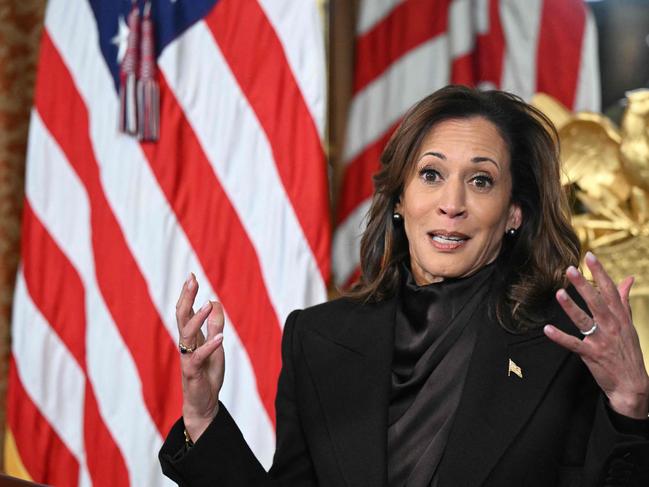 US Vice President Kamala Harris speaks after signing the drawer of her desk during a signing ceremony the Vice President's Ceremonial Office at the White House on Janauary 16, 2025. (Photo by Mandel NGAN / AFP)