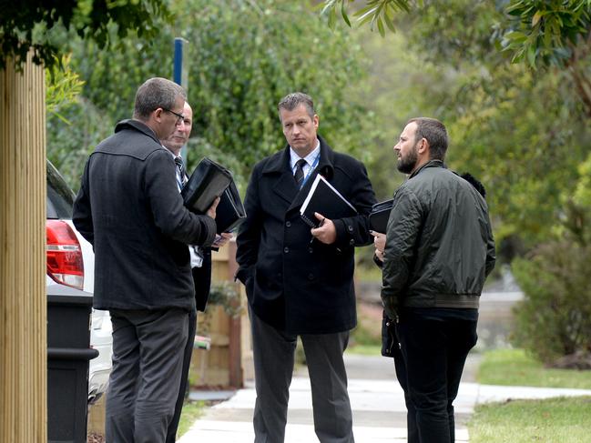 Police doorknock and speak to residents of Larissa Court, Croydon, after Saturday's murder on EastLink. Picture: Andrew Henshaw