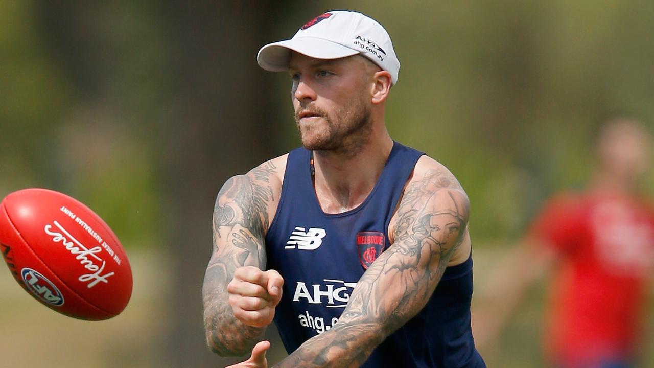 MELBOURNE, AUSTRALIA - DECEMBER 11: Nathan Jones handballs during a Melbourne Demons AFL pre-season training session at AAMI Park on December 11, 2015 in Melbourne, Australia. (Photo by Darrian Traynor/Getty Images)