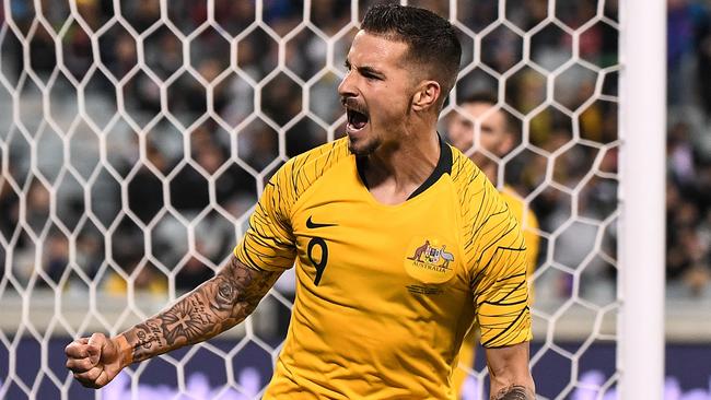 Jamie Maclaren and the Socceroos will have to wait to resume their Cup qualifying quest.