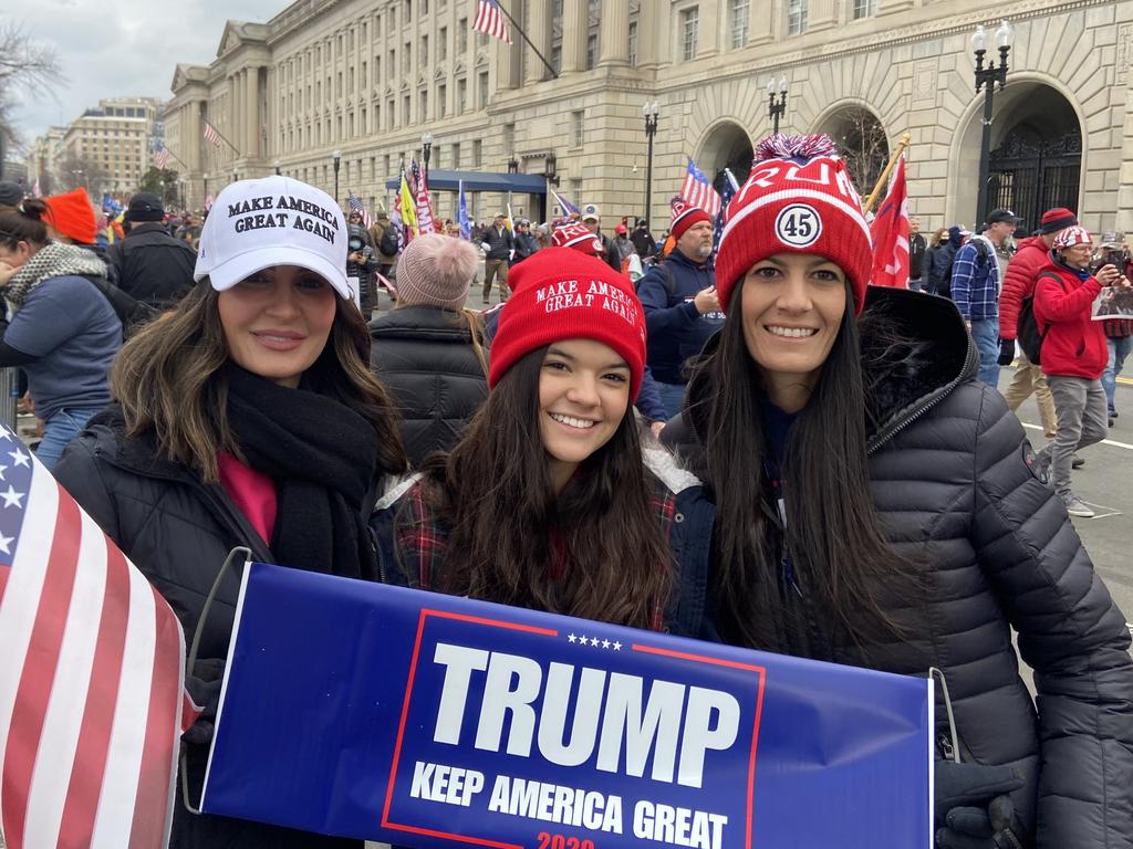 Emily Voitier (left) drove from Louisiana to pick up her niece Emma Collins, centre, and sister Mandy Collins to support Donald Trump.