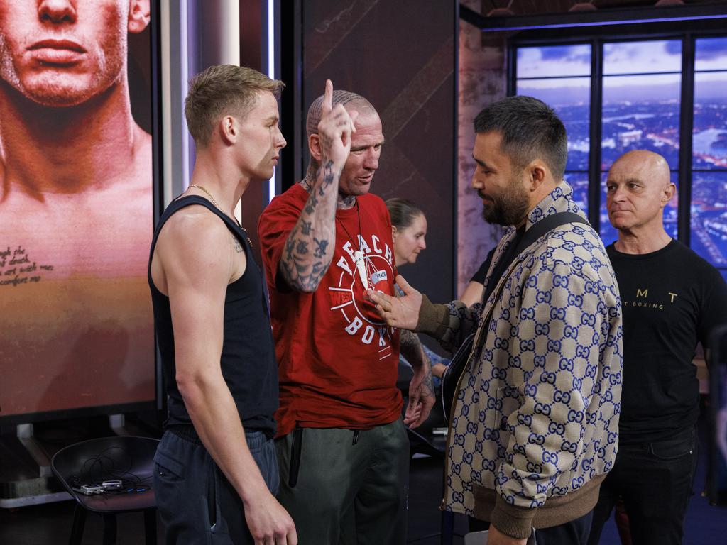 Isaac Peach (red t-shirt) clash with members of Janibek’s team including Berik Sultanov (back to camera). Picture: Toby Zerna