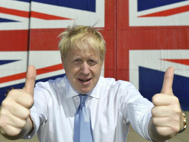 FILE - In this Thursday, June 27, 2019 file photo Conservative leadership candidate Boris Johnson gives the thumbs at the Wight Shipyard Company at Venture Quay during a visit to the Isle of Wight, England. (Dominic Lipinski/Pool Photo via AP, File)