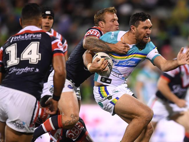 Jordan Rapana of the Raiders (right) is tackled by Jake Friend of the Roosters during the Round 12 NRL match between the Canberra Raiders and the Sydney Roosters at GIO Stadium in Canberra, Sunday, May 28, 2017. (AAP Image/Lukas Coch) NO ARCHIVING, EDITORIAL USE ONLY