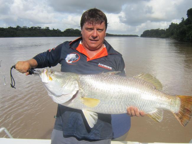 Chris Woolley with a 110cm barramundi from the Daly River, caught on a DOA lure. Picture courtesy CRAIG'S FISHING WAREHOUSE