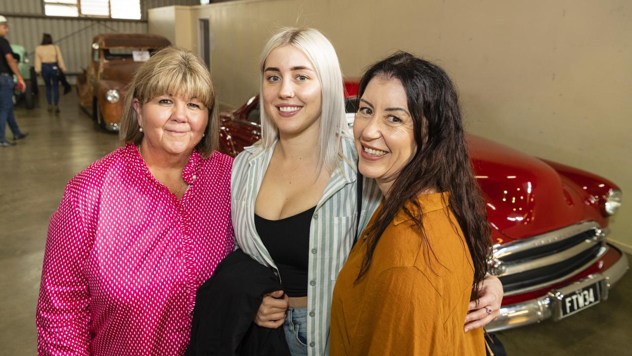 Checking out the cars on show are (from left) Gail Ellis, Charlotte Donald and Amanda Pringle at Meatstock at Toowoomba Showgrounds, Friday, April 8, 2022. Picture: Kevin Farmer