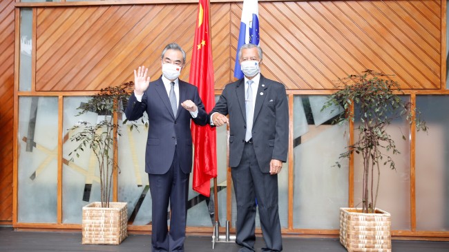 Chinese Foreign Minister Wang (left) meets with Pacific Islands Forum Secretary-General Henry Puna in Suva, May 29, 2022. Picture: Getty Images