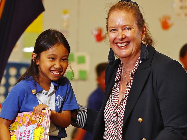 10.12.21 WEEKEND TELEGRAPHS SPECIAL. MUST NOT USE BEFORE CLEARING WITH PIC EDITOR JEFF DARMANIN. Kerry Weston, Principal at Guilford West Public School pictured with some kids from year 1. Annabelle Ly on left. Picture: Sam Ruttyn