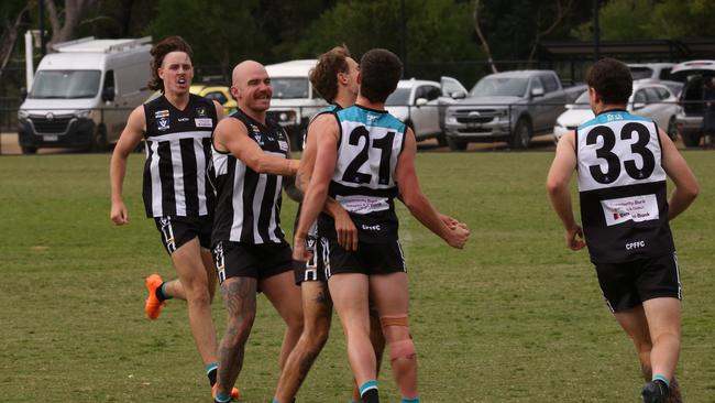 Crib Point players celebrate a goal on Saturday. Picture: Euan Poulton